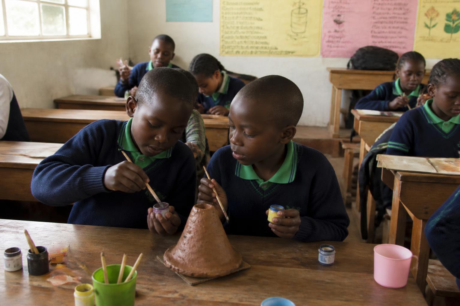 Learners taking part in a hands-on creative classroom activity